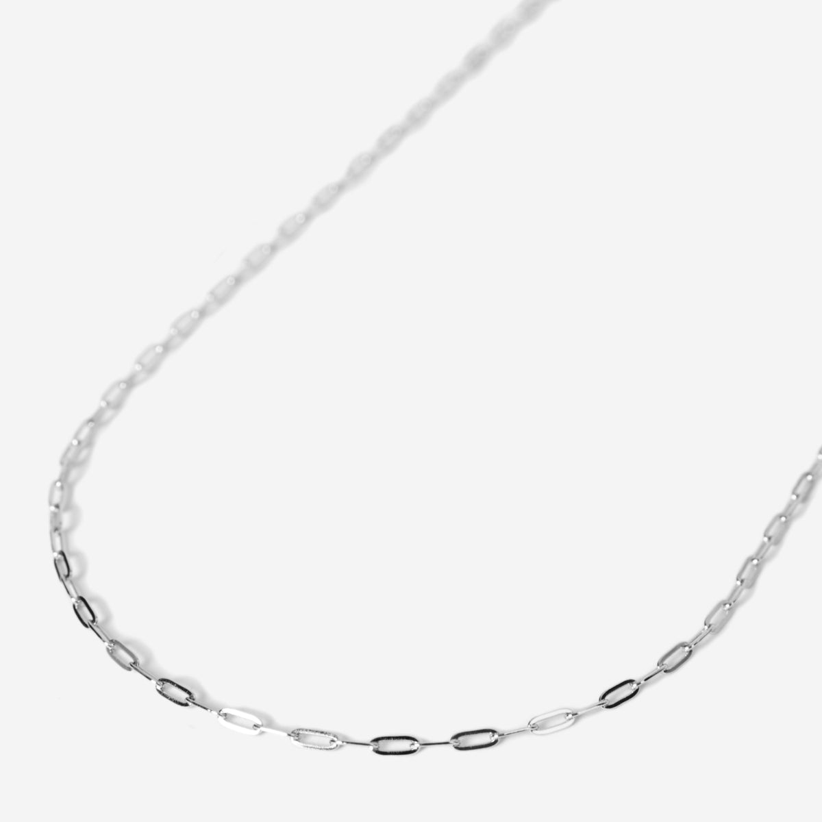 A men's sterling silver Slim Link Necklace from Billie Jo, featuring delicate, elongated oval links for a modern, minimalist aesthetic.
