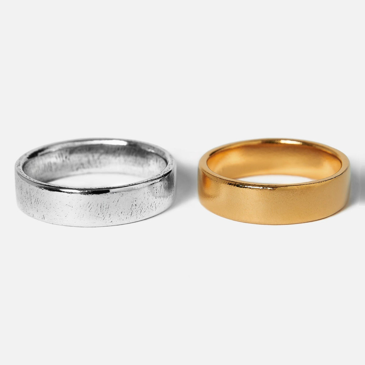 Billie Jo's Serenity Silver & Gold ring set, showcasing the textured sterling silver and the smooth 18k gold vermeil bands side-by-side on a white background.