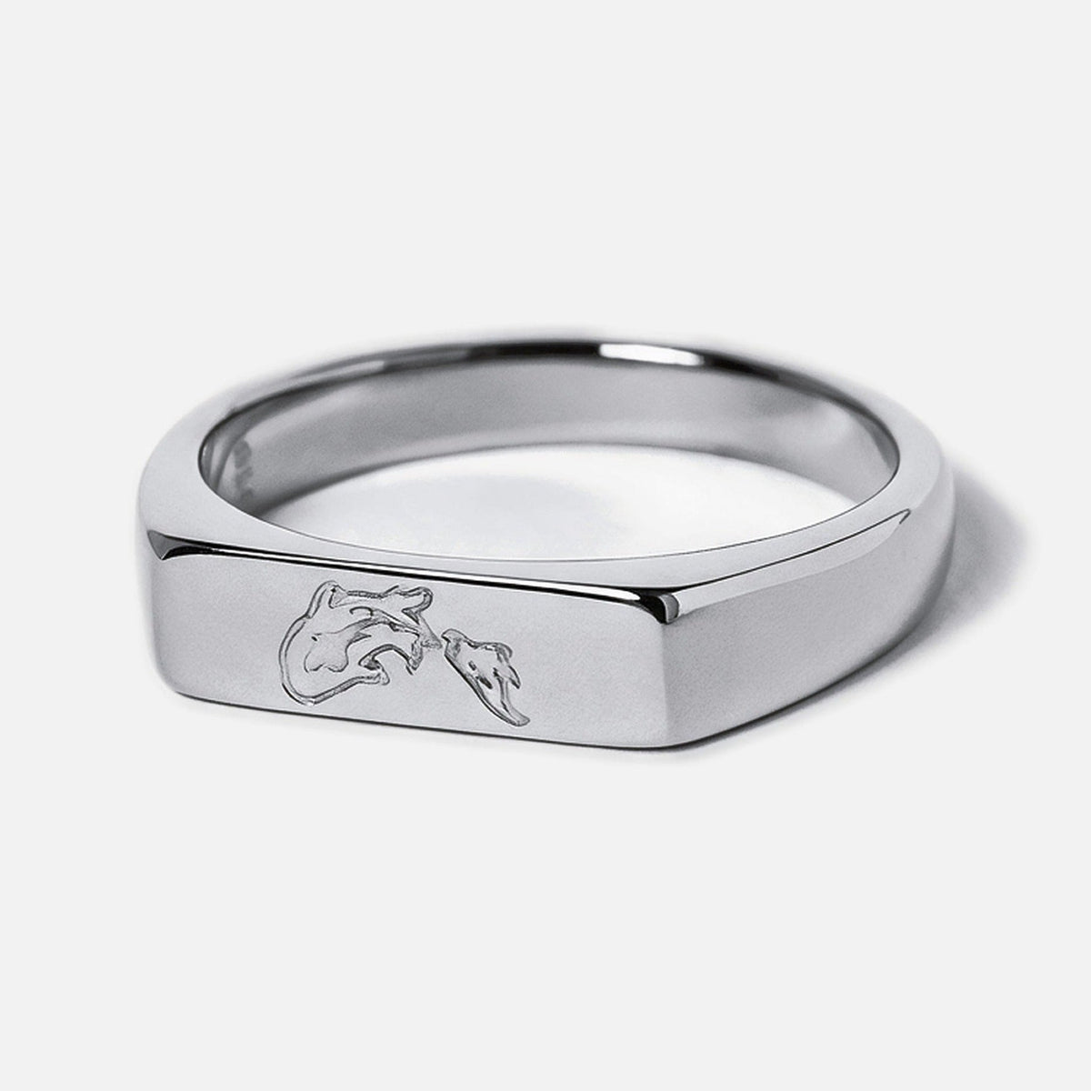 Men's Koi II Ring in 316L stainless steel, silver finish, angled front view showing the koi outline engraved on the bar face