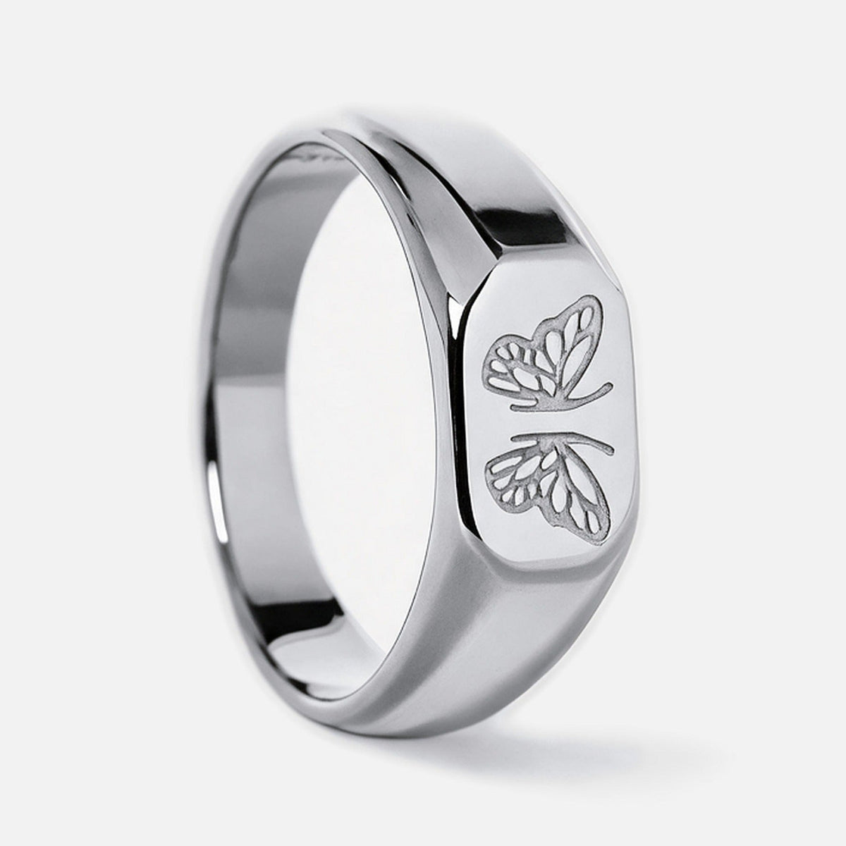 Men's Revival Ring in 316L stainless steel, silver finish, upright side view of the butterfly face, white background