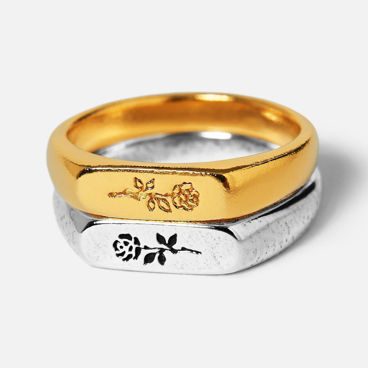 Billie Jo's Rosa Stacker rings in 18k gold vermeil and 925 sterling silver, featuring an elegant engraved rose design. A modern men's jewellery set.