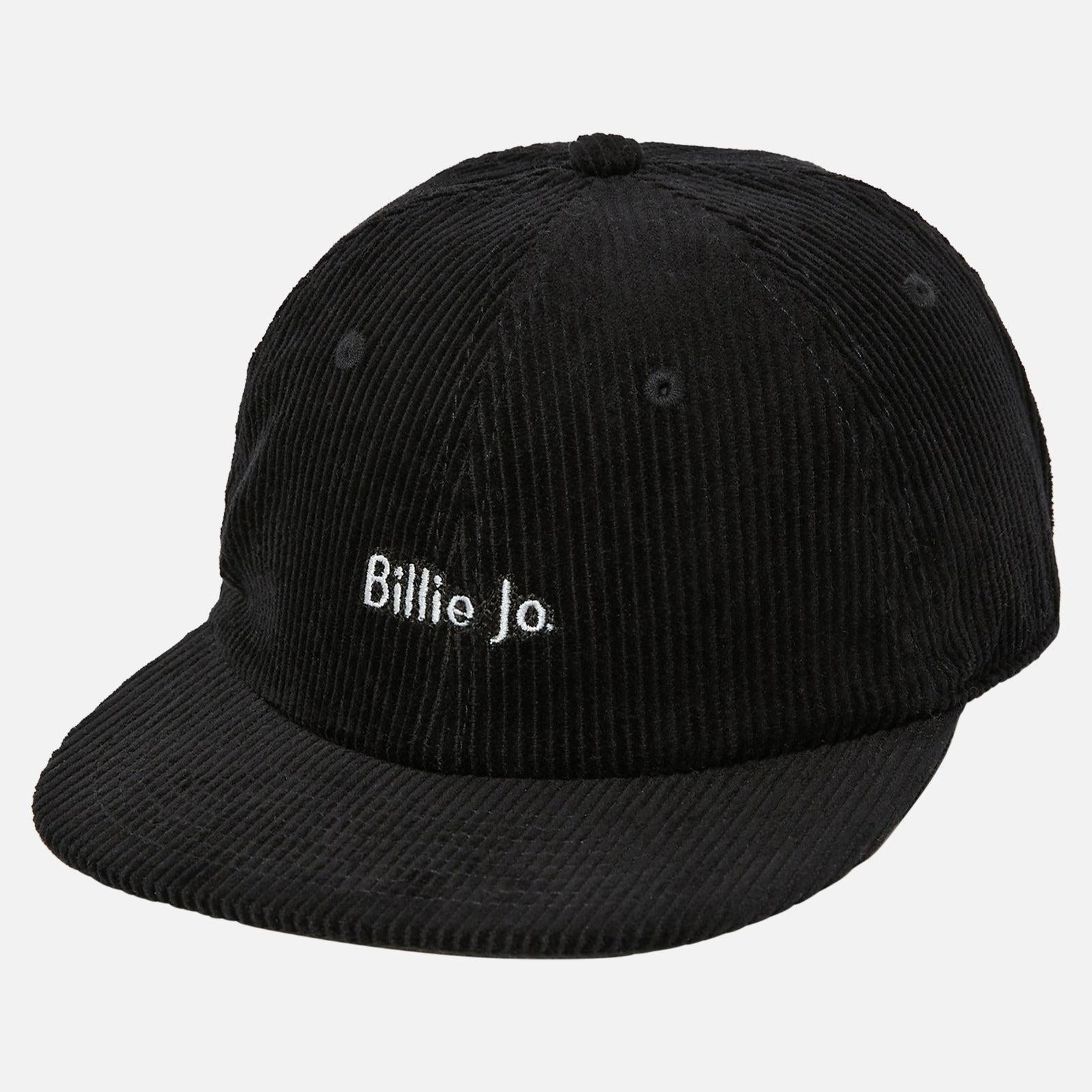 Front-facing shot of Billie Jo rings styled with a minimalist black hat.