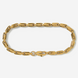 Gold chain bracelet on a light gray background