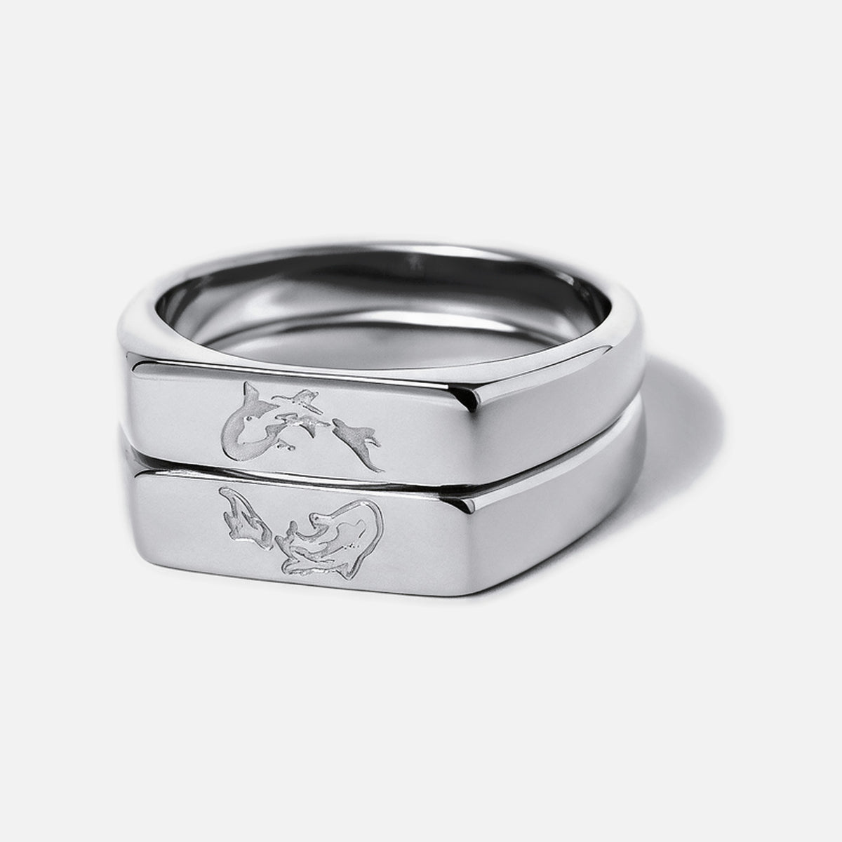 Men's Koi Stackers in 316L stainless steel, silver finish, pair stacked, koi engraved on each face
