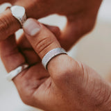 Studio-edited shot of Billie Jo rings capturing reflective shine.